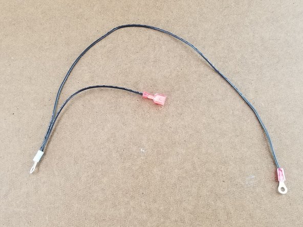 Crimp the spade terminal on the remaining end of the short wire.