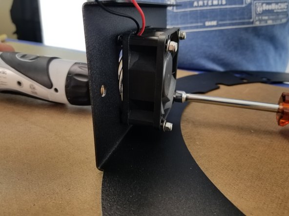 Place a washer over each of the 4 screws and secure with the M3 nylon lock nuts.