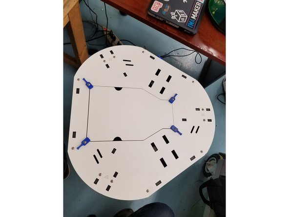 Install the top plate using the same 6/32 1&quot; L screws you removed in the beginning. Screw them into the captive nylon lock nuts in the injection molded motor mounts and side panels.