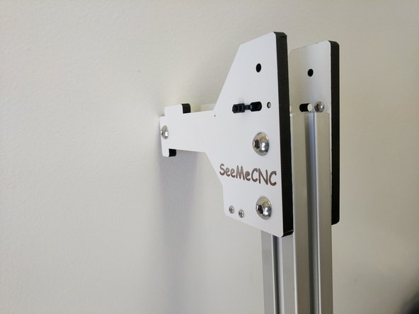 Slide the top tower mount assembly onto the 24&quot; long piece of TSLOT until it reaches the stop screws. Loosely tighten the button head screws. DO NOT FULLY TIGHTEN.