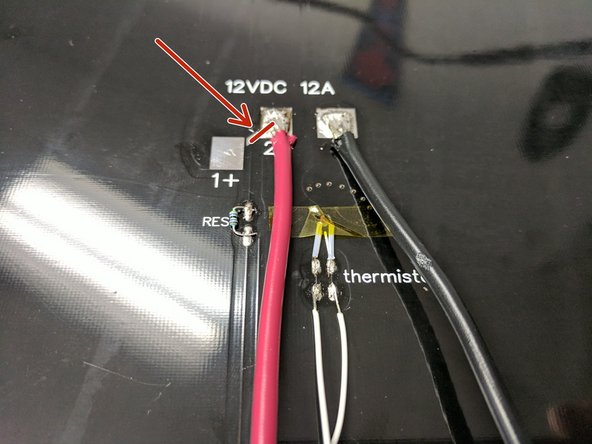 Solder the thermistor leads to the pads where indicated. There is not polarity so either wire on either pad will work. Since these pads are smaller, you want to be sure not to heat them too hot for too long or the pad can detach from the board.