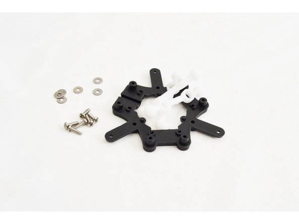 From the  290mm IM Arm / Platform Sub-Assembly Pack (70871), locate the Ball Joint Platform (70857), (3) Ball Joints for IM Carriage/Platform (70855), (6) #4 x 3/8&quot; sheet metal screws (30250), and (6) #4 SAE Flat Washers (30449). Set the rest of the parts from that pack aside for later use in Final Assembly.