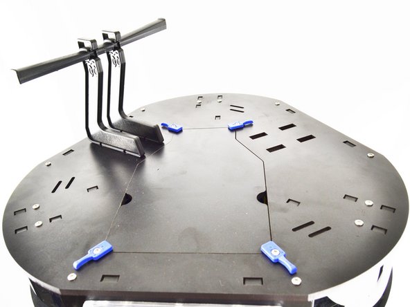 Slide the spool holder assembly towards the outer edge of the printer, locking it in place.