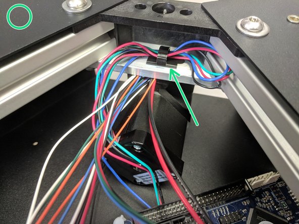 Begin with connecting the X Stepper motor in the location  indicated by a blue arrow in the image with the blue circle. **** Machines AFTER 3/20/2018: Motors can have a black connector and different color wiring, They are connected with the smooth side of the plug facing away from the Duet as shown in picture 3.  ****
