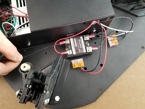 Attach the ring terminal to the solid state  relay in the remaining location next to the power supply as shown in Pic 2.