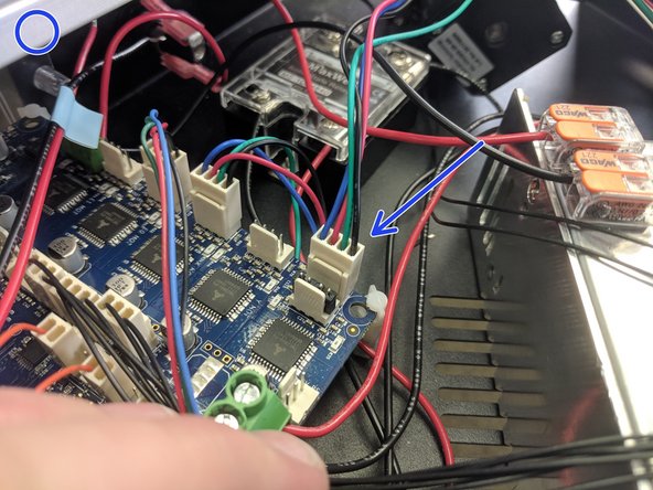 Connect the Z Stepper motor in the location indicated in the image with the blue circle.