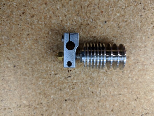 The main body of the hotend will come finger tight. Do not use this as assembled.