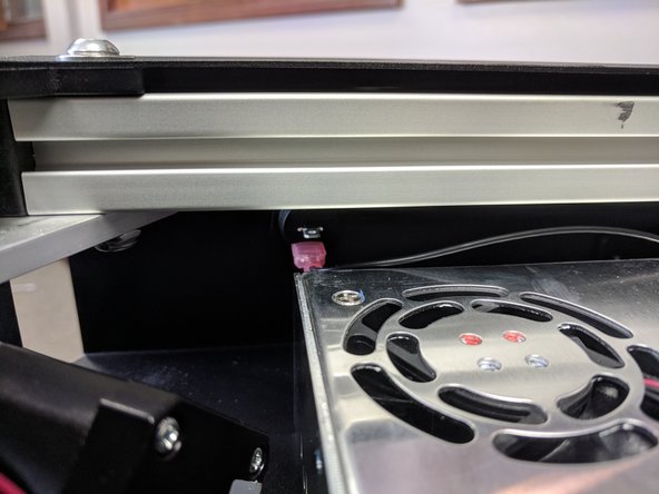 Install the spade connector (crimped on the remaining black 18awg wire) to the top of the rocker switch (front face of the printer).