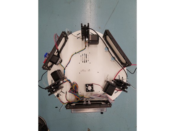 Next unscrew the 4 nylon standoffs holding the Rambo Board up. You will want to hold the standoff in place with one hand, while unscrewing it with the other from the bottom of the Laser Cut Plate.