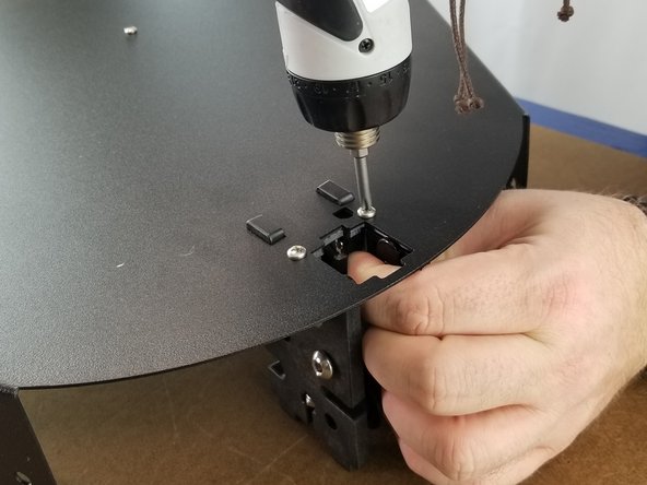 Using the 6-32 x 7/8&quot; long screws, secure the motor brackets to the top frame as shown in Pic 3.