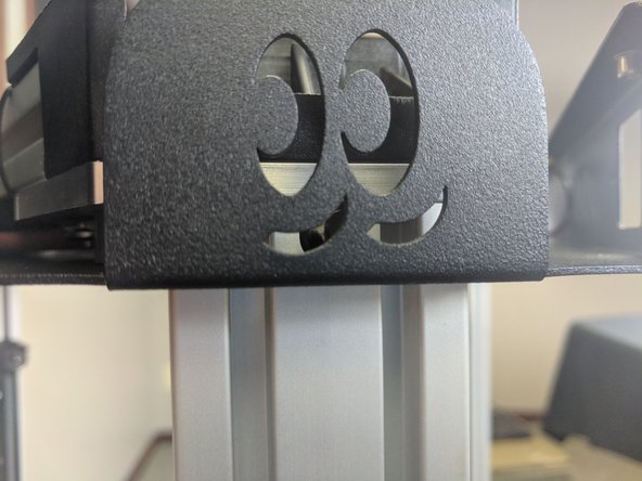 Check to ensure that the wires are all contained within the relief in the T-Slot. you can look through the Blinky Eyes in the sheet metal near the Z tower.