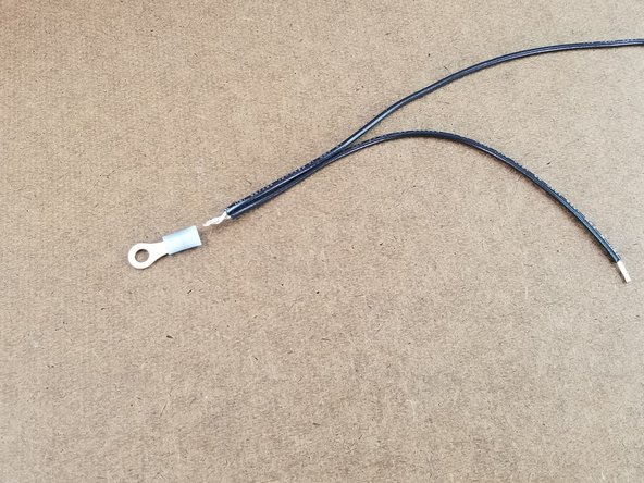 Combine the ends of the black wires together like the previous steps and crimp the blue connector on the combined wires.