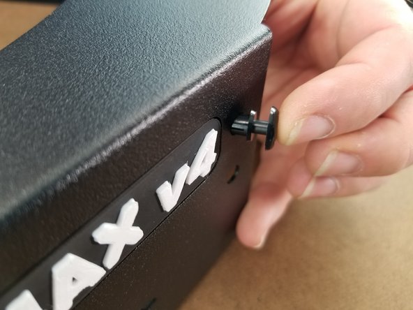 Insert the name plate from the backside of the sheet metal into the rectangle opening.