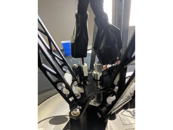 Plug in the connectors on the top of the hot end. The connectors are all 3 keyed, so there is only one way to install them.