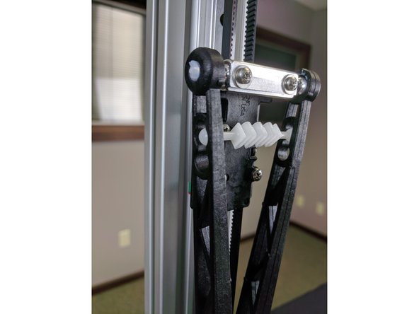 Before installing the arms, apply the provided lubricant to the ball joints. Use a q-tip, finger, or similar item to apply a small amount of lubricant to each aluminum ball joint on the carriage and on the hot end (6 total ball joints)