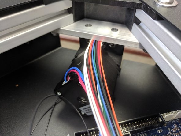 Make sure to look from the outside of the tower towards the center of the upper assembly and ensure that the wires are ALL in their relief.