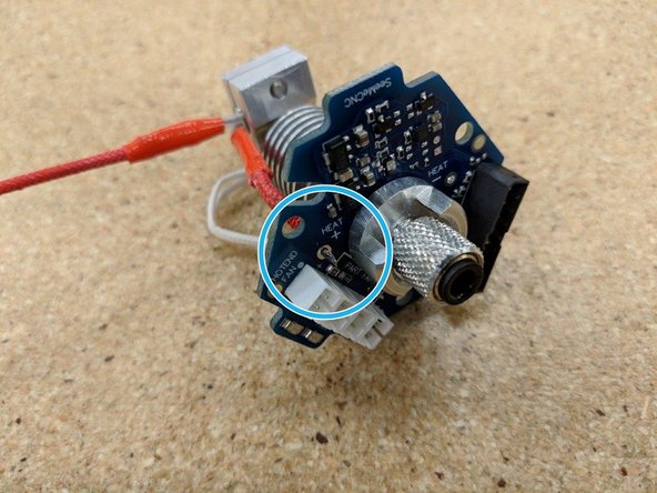 Route the second heater cartridge lead as shown.