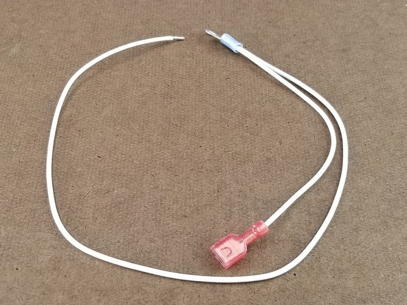 You will now have a white wire harness as shown in pic 3 with both white wires going to the blue ring terminal, and the short white wire with a spade connector.