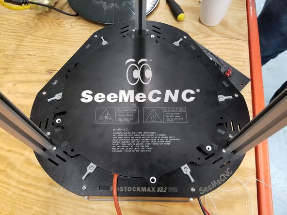 Place the new 84671 RMAXv4 Heat Spreader Laser Etched as shown to position holes.