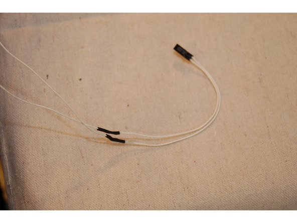 Cut the remaining length of 1/8&quot; diameter heat shrink in half.