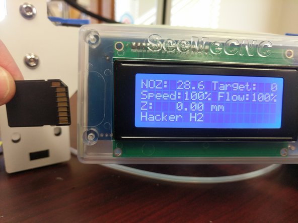 Once you have inserted the SD card into the SD card reader the printer will automatically recognize its presence and show you a list of all the files on the card.