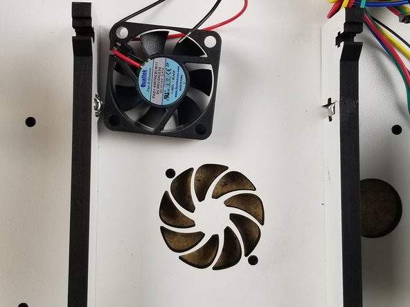 The 40mm fan gets installed under the Duet WiFi board using (2) M3 22mm socket head bolts, (2) rubber o-rings, and (2) nylon lock nuts.