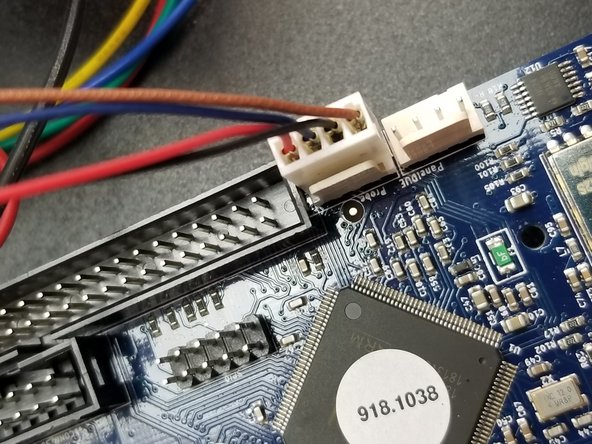 The 4 pin connector from the hotend whip will plug into the first position next to the long black connector on the side of the Duet as shown in Pic 1.