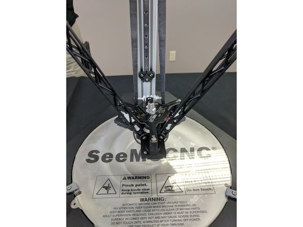 The easiest way to install the arms is to attach one arm to one of the ball joints, then insert the tension spring between the two arms.