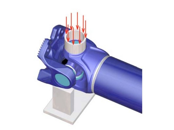 
Force o rolamento para fora do garfo do tubo com uma prensa.
