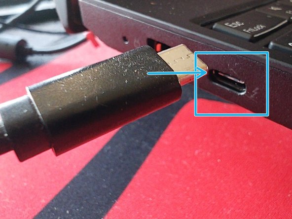 Connect one end of the USB C to USB C cable to your PC