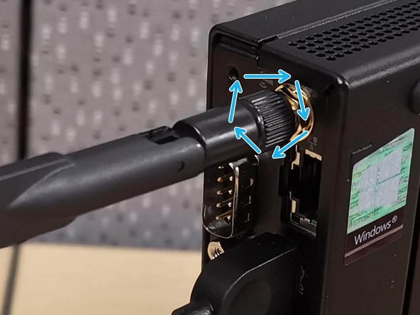 Twist the end of the Wi-Fi Antenna clock wise to secure it