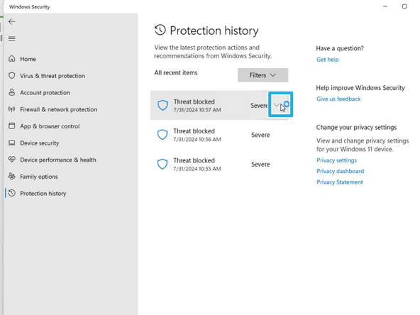 Click the Threat Severity Arrow