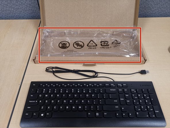 Put the plastic wrap back in the keyboard box