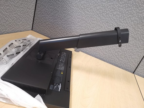 Remove the cover from the arm