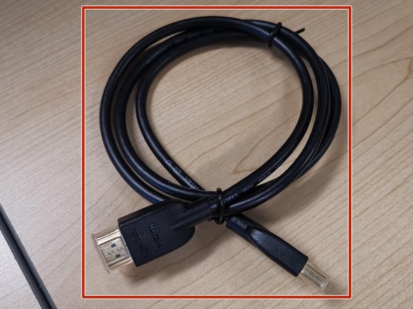 The HDMI cable is provided separately.  If you did not receive one, contact your hiring manager.