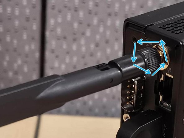 Twist the end of the Wi-Fi Antenna counter clockwise to unscrew it