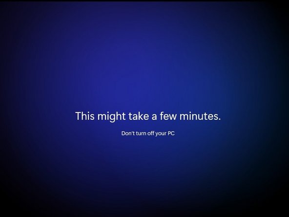 Be patient while your PC checks for updates and prepares to boot for the first time.