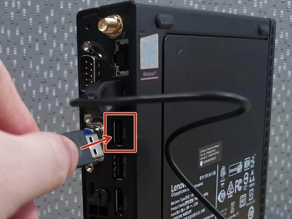 Plug your Keyboard into the USB port below the mouse