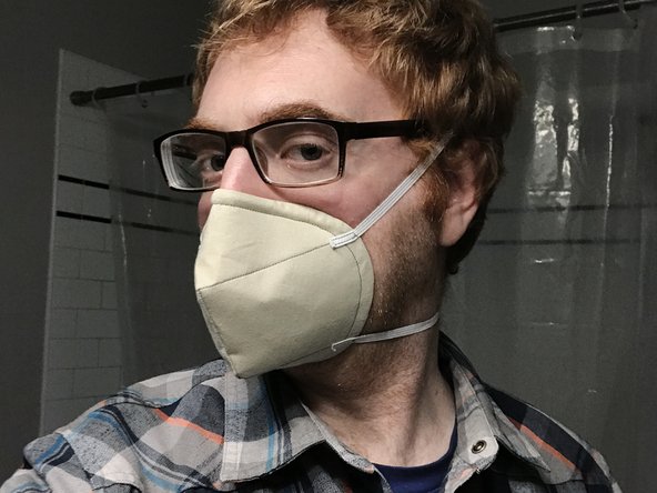 WARNING: Wearing the mask will directly expose it to any germs that you're carrying. If you're planning to donate this mask, do not try it on yourself unless you're going to wash it before donating it. You can spread COVID-19 to others even if you don't have any symptoms yourself.