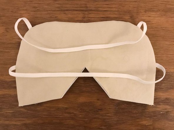 Be especially careful not to tear the interface material while doing this, especially at the two inner sharp angles (marked with arrows).