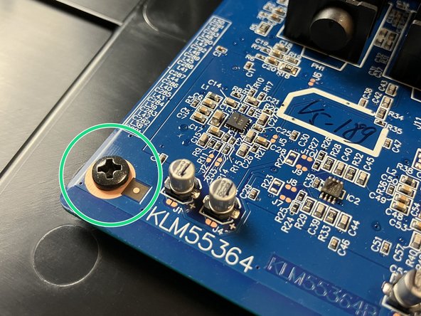 To avoid any potential damage, don't touch any of the components on the main board with the metal screwdriver.