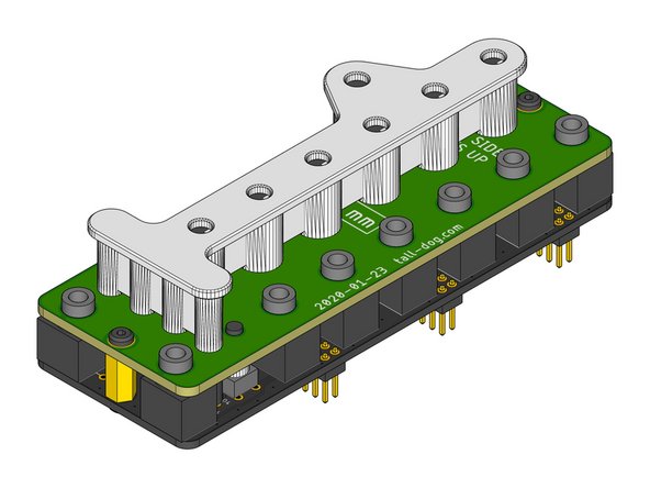 Make sure that the flat side of the Assembly Cap is facing up when orienting it relative to the top surface of the Control Board as shown.