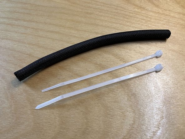 Locate the 6″ strip of cable wrap and the two 4″ cable ties from the parts bag.