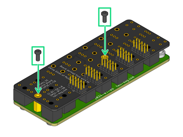 Grip the pair of boards and flip them over while applying slight pressure, holding them together so that none of the components become unseated.