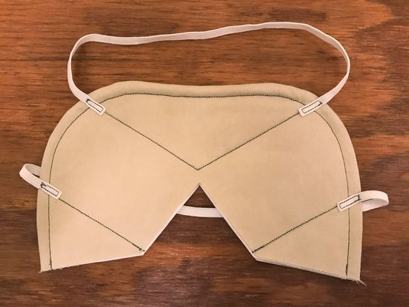 The angle of the elastic should roughly follow the angle of the sewn straight line.