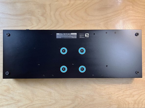 Flip the enclosure over so the bottom surface is facing up.