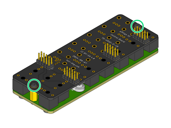 Locate and fasten two M2.5 × 6 mm pan head machine screws to secure the Assembly Template to the Control Board, sandwiching all of the loose components and the Assembly Spacer solidly in-between them.