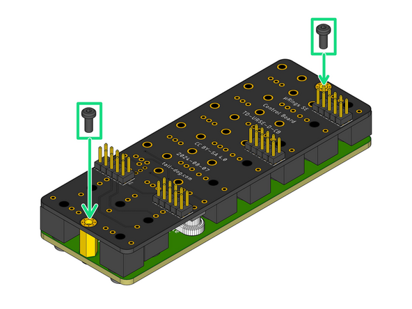 Grip the pair of boards and flip them over while applying slight pressure, holding them together so that none of the components become unseated.