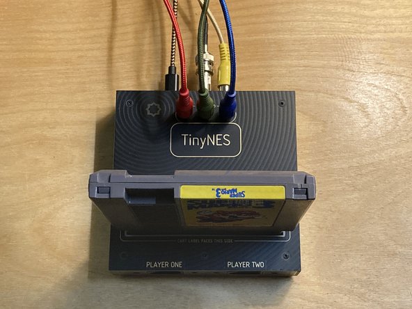 The new green RCA cable goes in the green RCA jack on the top of the console.