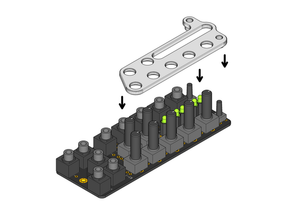 Locate the white plastic Assembly Spacer part.